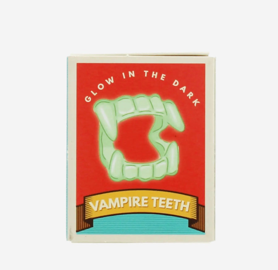 Glow in the dark vampire teeth