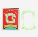 Glow in the dark vampire teeth