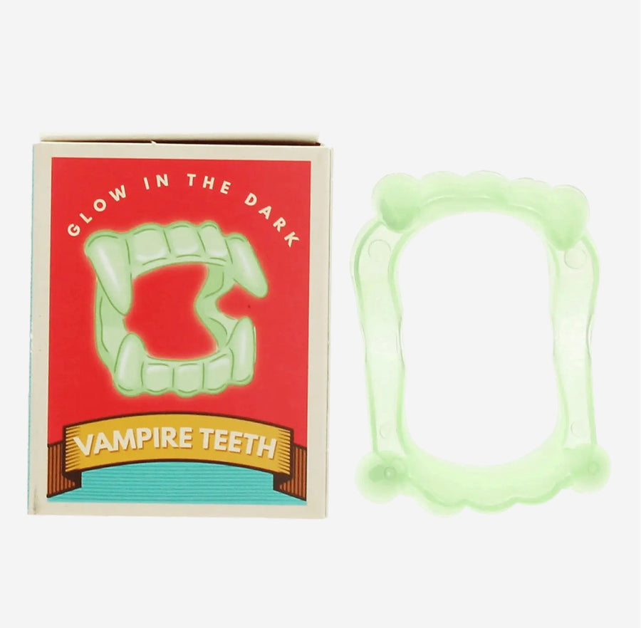 Glow in the dark vampire teeth
